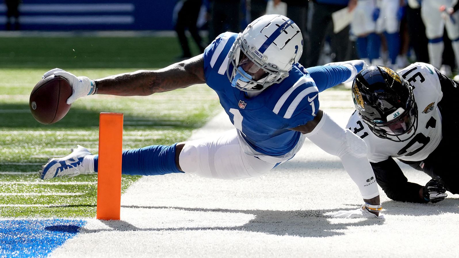 Indianapolis Colts wide receiver Parris Campbell stretches to get the ball over the pylon for a touchdown while defended by Jacksonville Jaguars cornerback Darious Williams. The Colts beat their division rivals 34-27 thanks to a last-gasp touchdown from quarterback Matt Ryan to rookie Alec Pierce. 