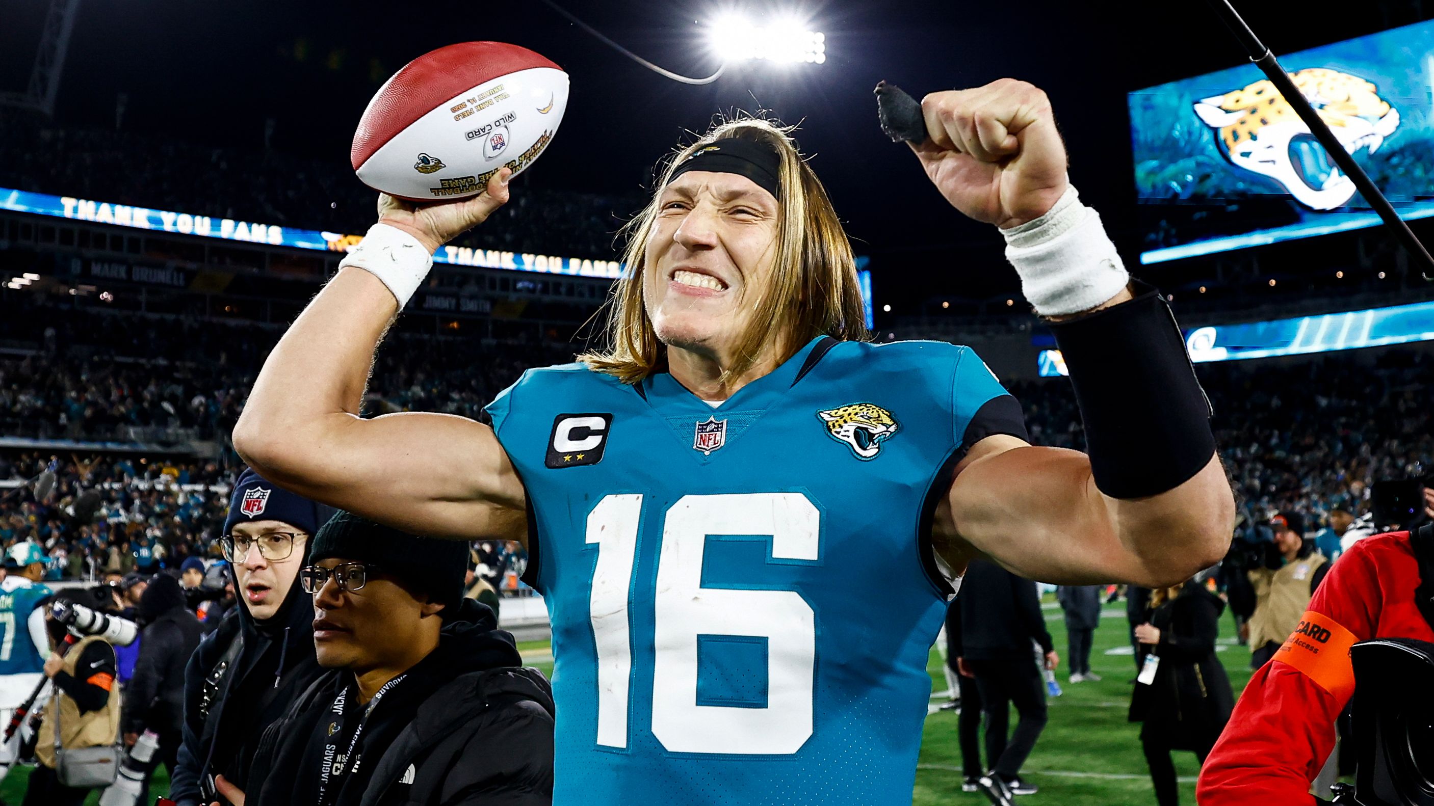 Jacksonville Jaguars quarterback Trevor Lawrence celebrates on the field after completing a massive comeback against the Los Angeles Chargers. Lawrence threw four interceptions -- and also four touchdowns -- as he led the Jaguars back from 27-0 down in the first half to beat the Chargers 31-30 thanks to a last-second field goal.  