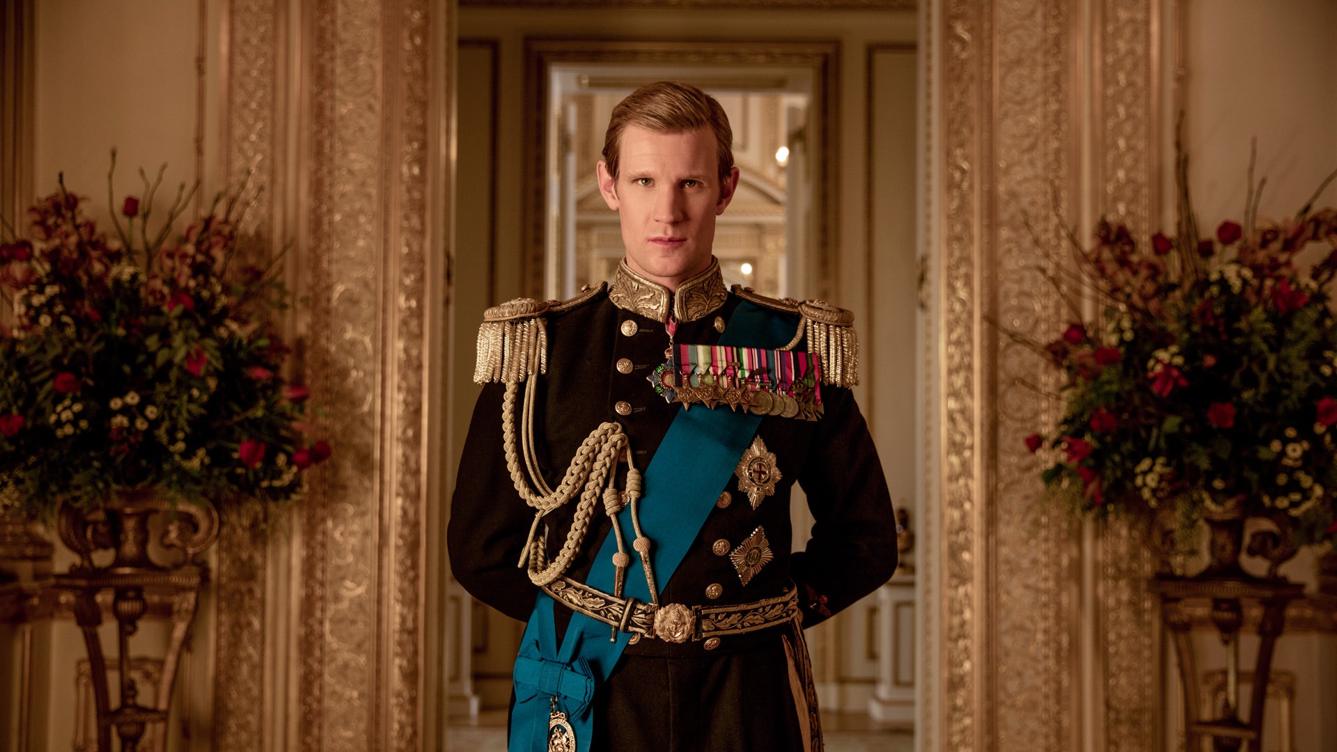 Image may contain Matt Smith Human Person Military Uniform Military Plant Flower Blossom and Furniture