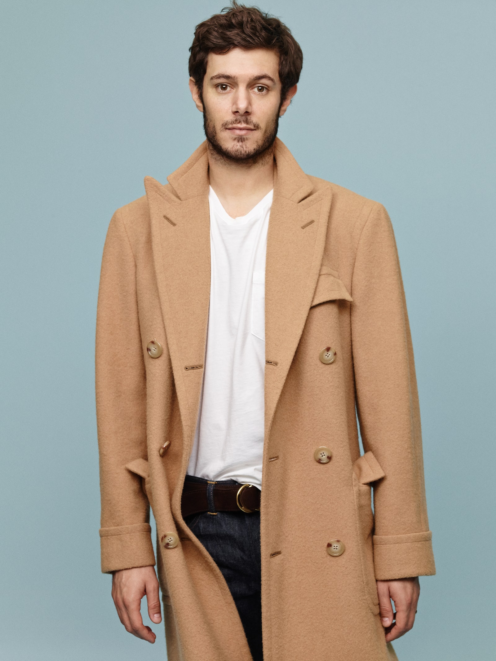 Image may contain Adam Brody Clothing Apparel Overcoat Coat Human Person and Jacket