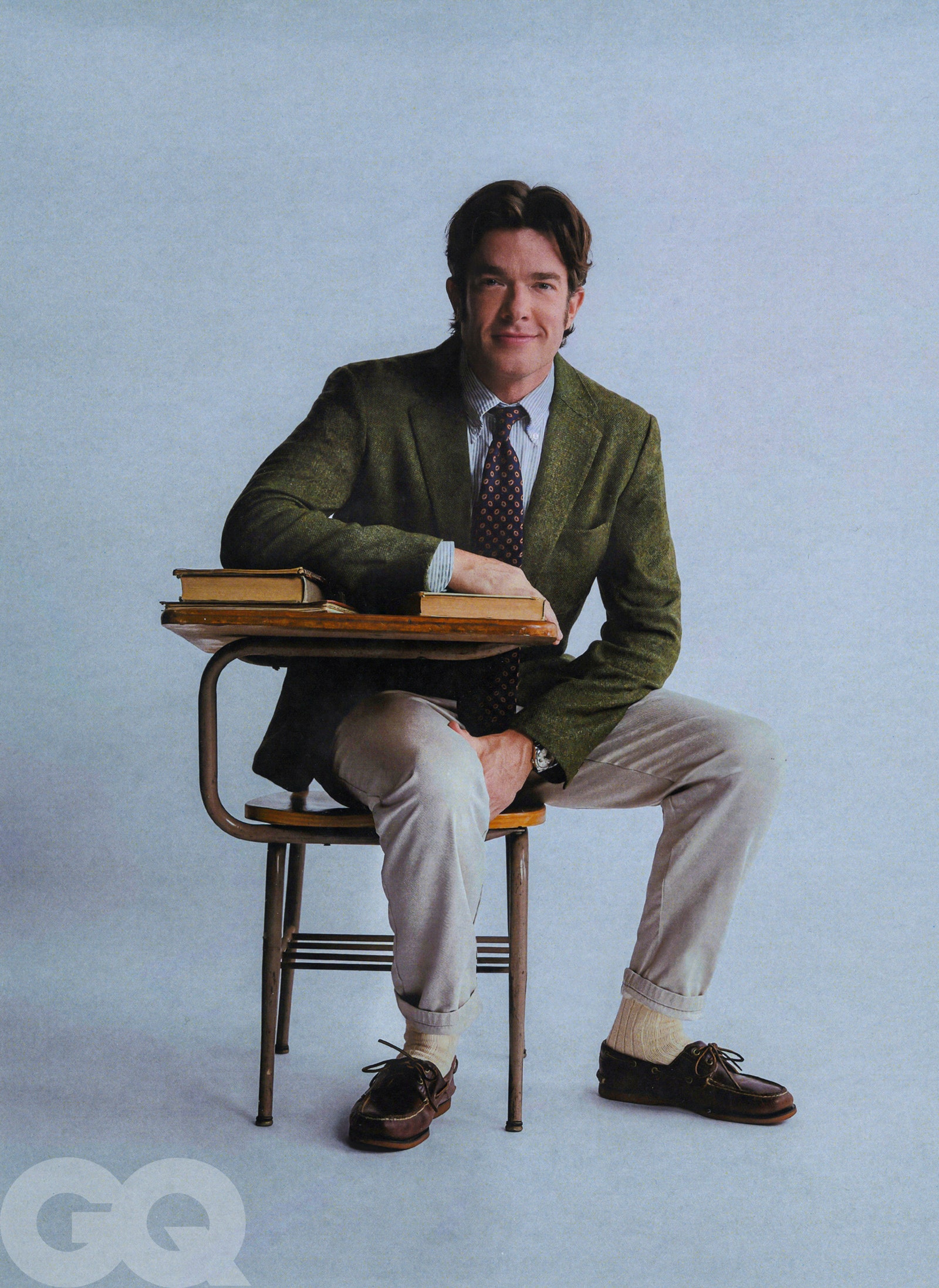 Image may contain John Mulaney Person Sitting Face Head Photography Portrait Clothing Footwear Shoe and Adult