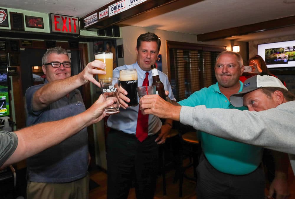 Gubernatorial candidate Geoff Diehl makes a toast during his pre-primary Get Out The Vote stop at the Union Brew House on Sept. 6. (Barry Chin/The Boston Globe via Getty Images)