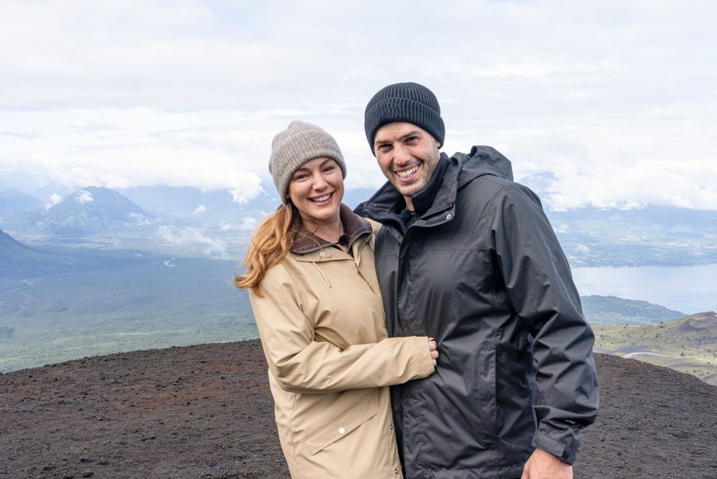 Celebrity Race Across The World stars Kelly Brook and husband Jeremy Parisi cuddling on a mountain
