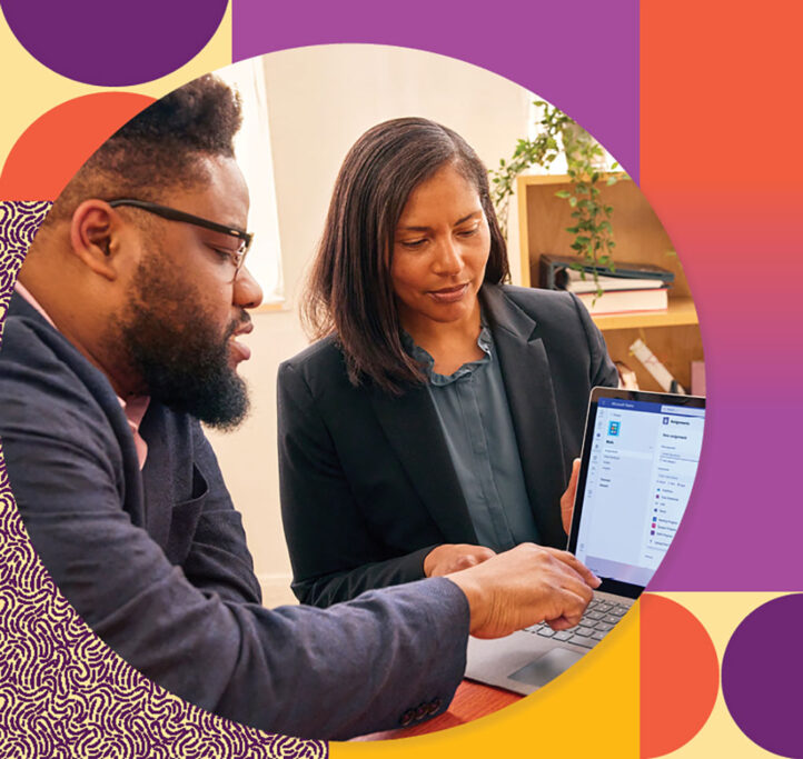 Woman and man discussing what's displayed on a laptop