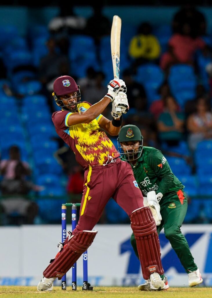 West Indies' Roston Chase plays an attacking shot during the second T20 match against Bangladesh at the Arnos Vale Stadium, St Vincent and the Grenadines on December 17. Photo courtesy Randy Brooks/CWI Media.  - 