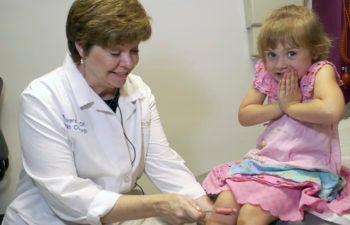 School nurse with student