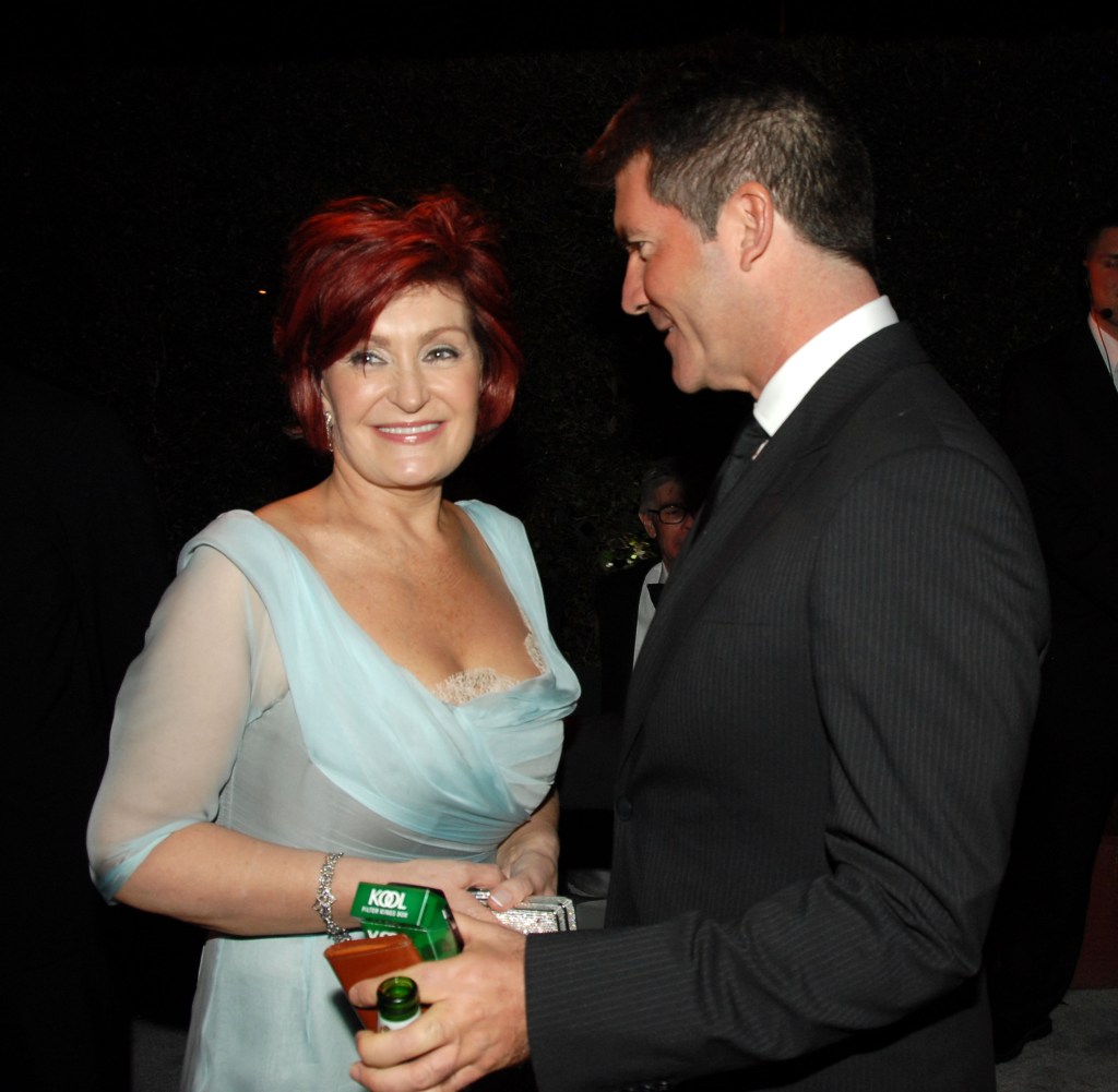 Sharon Osbourne with Simon Cowell. 