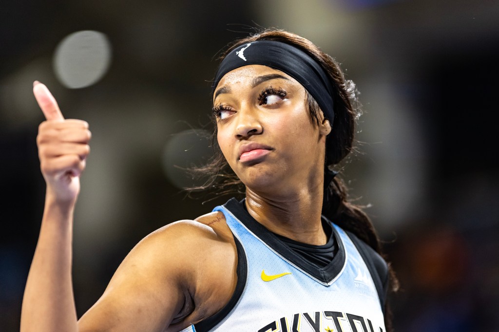 Angel Reese #5 of the Chicago Sky celebrates her team taking a big lead in the fourth quarter against the Los Angeles Sparks at Wintrust Arena on September 6, 2024.