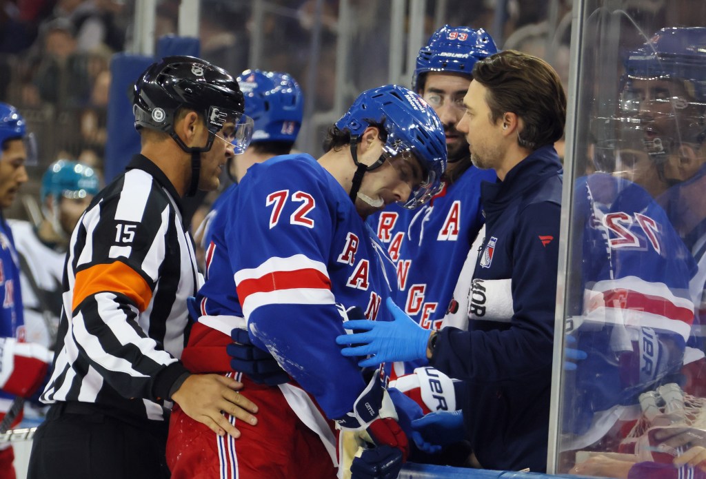 Filip Chytil exits teh Rangers-Sharks game with an injury on Nov. 14, 2024. 