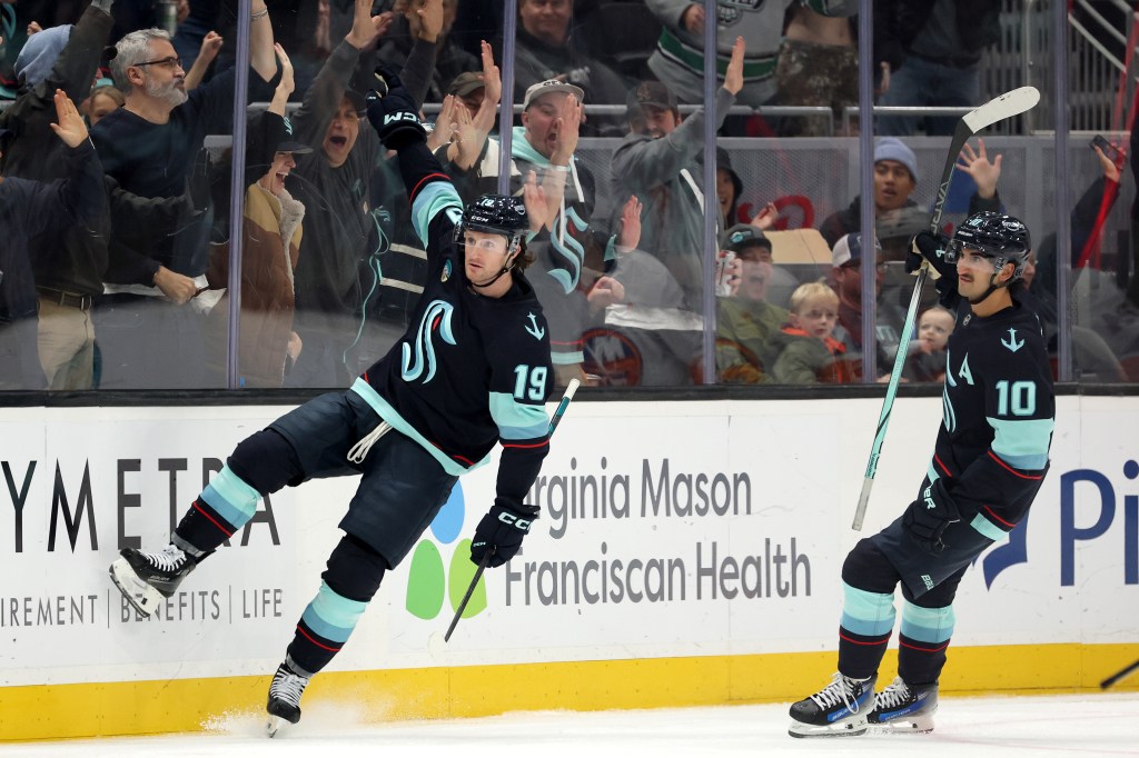 Jared McCann #19 of the Seattle Kraken celebrates his goal during the third period against the New York Islanders at Climate Pledge Arena on November 16, 2024 in Seattle, Washington. 