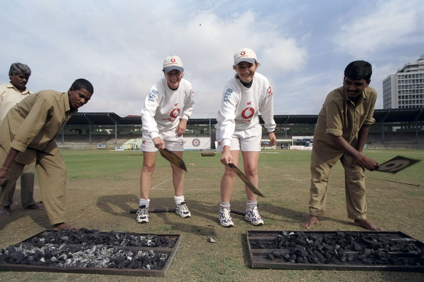 A good day to dry hard: Clare Taylor (left) and Charlotte Edwards have a braai before their match against South Africa