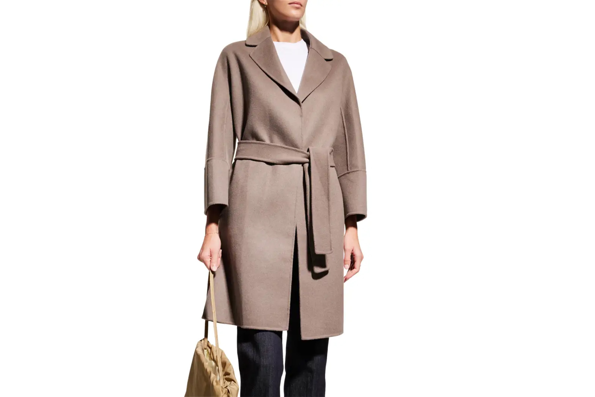 A model in a camel-colored wrap coat