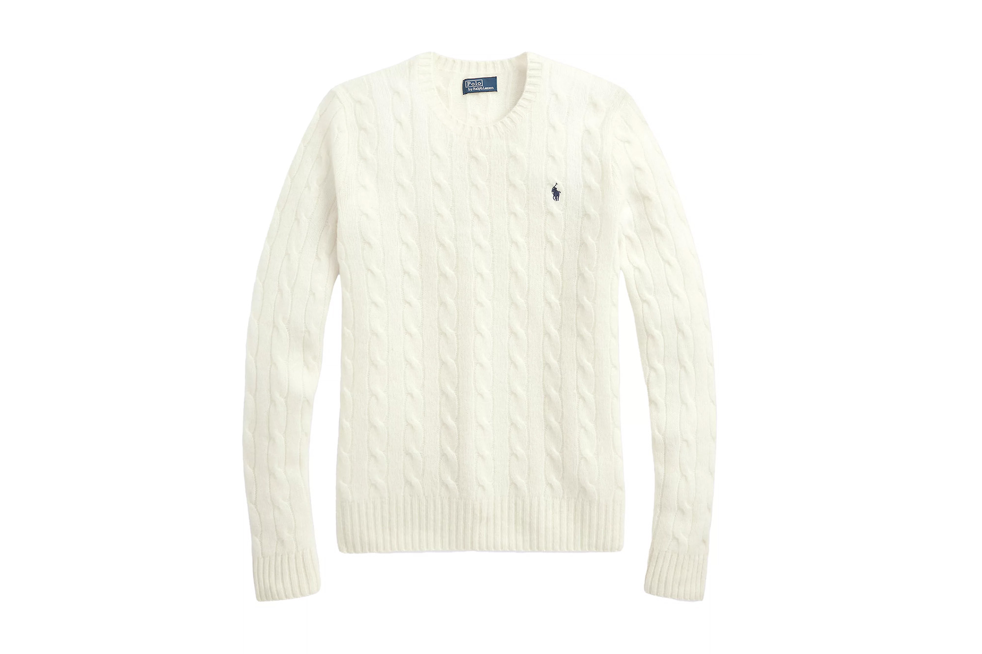 A white cable knit sweater