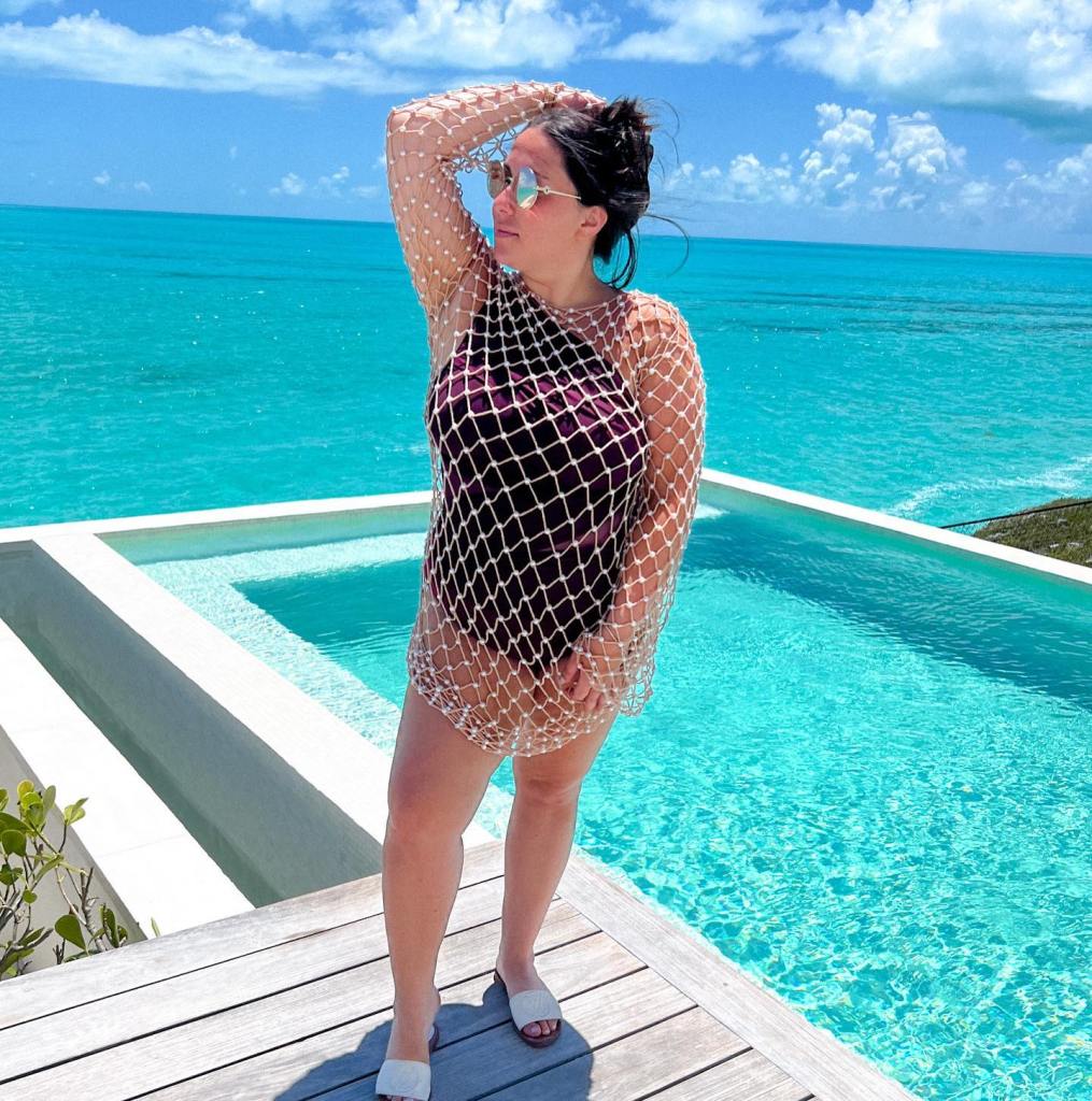 Claudia Oshry in a bathing suit. 