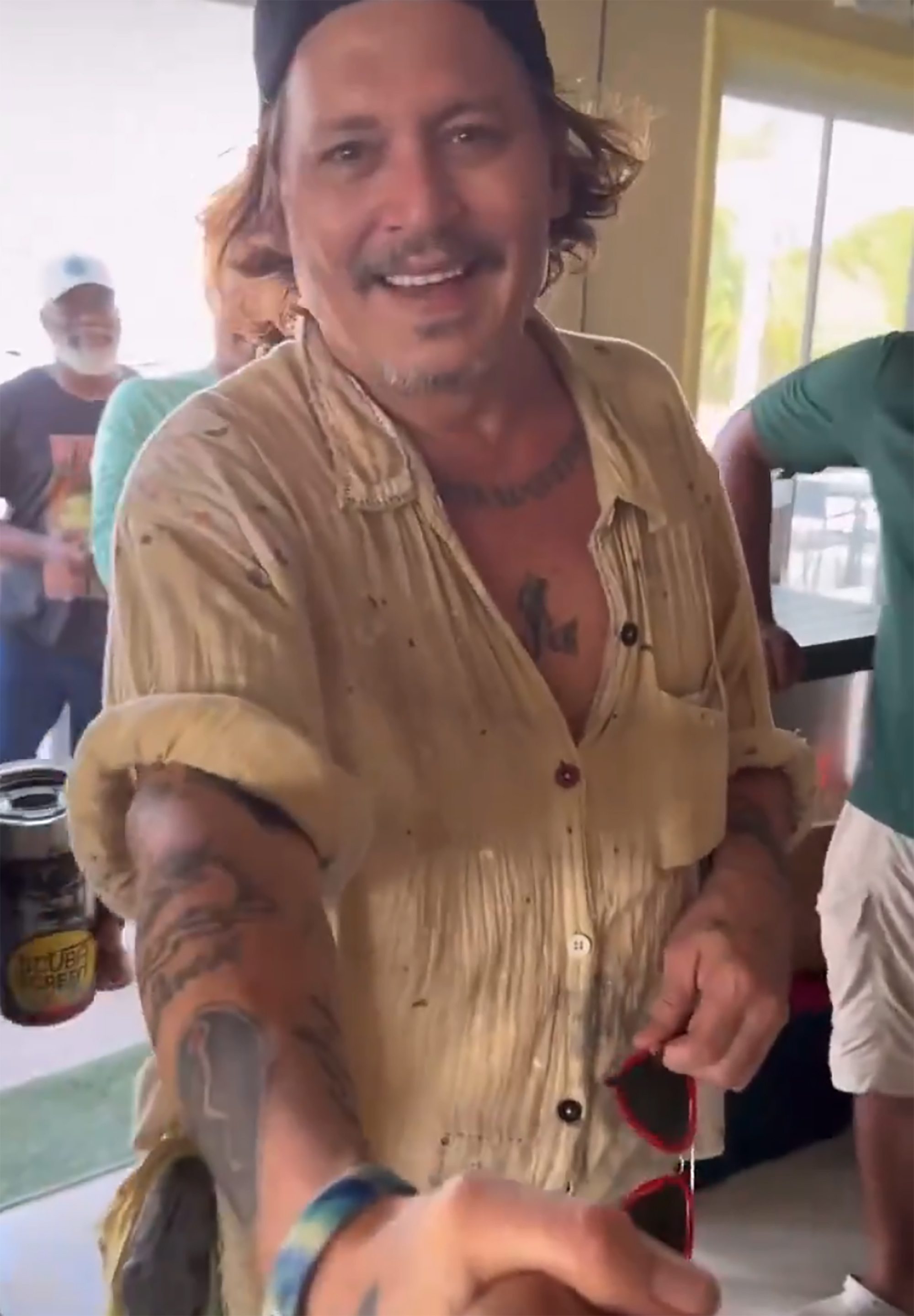 Johnny Depp smiling in recent Instagram video taken in the Bahamas