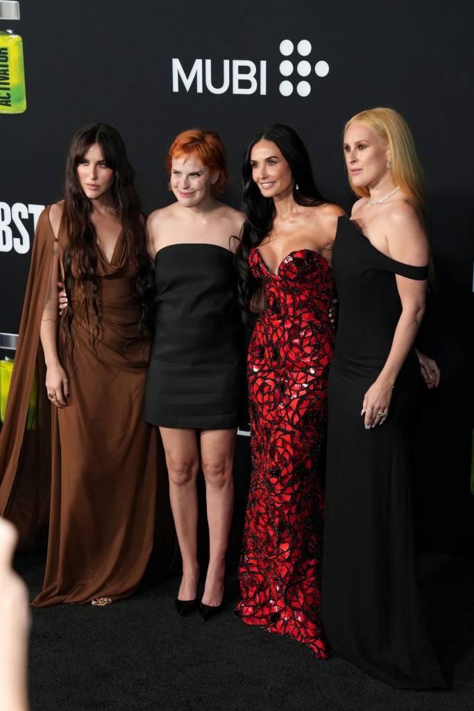 Demi Moore with her daughters Scout, Tallulah and Rumer at the premiere of "The Substance" in Los Angeles on Sept. 16. 