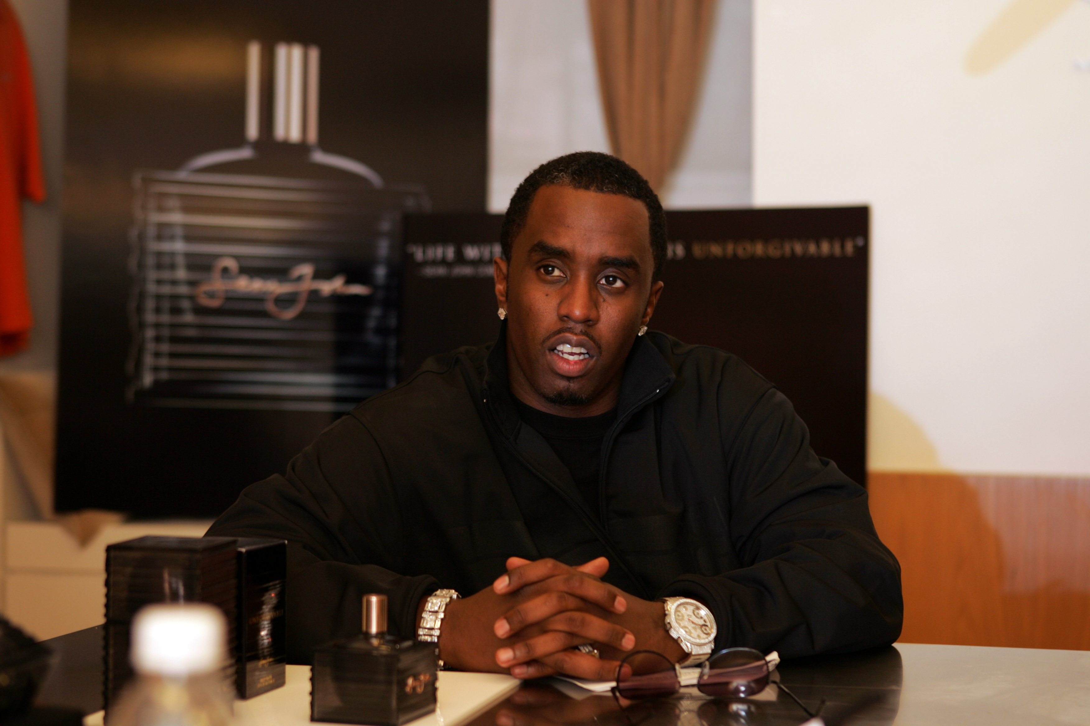 Sean "Diddy" Combs sitting down.