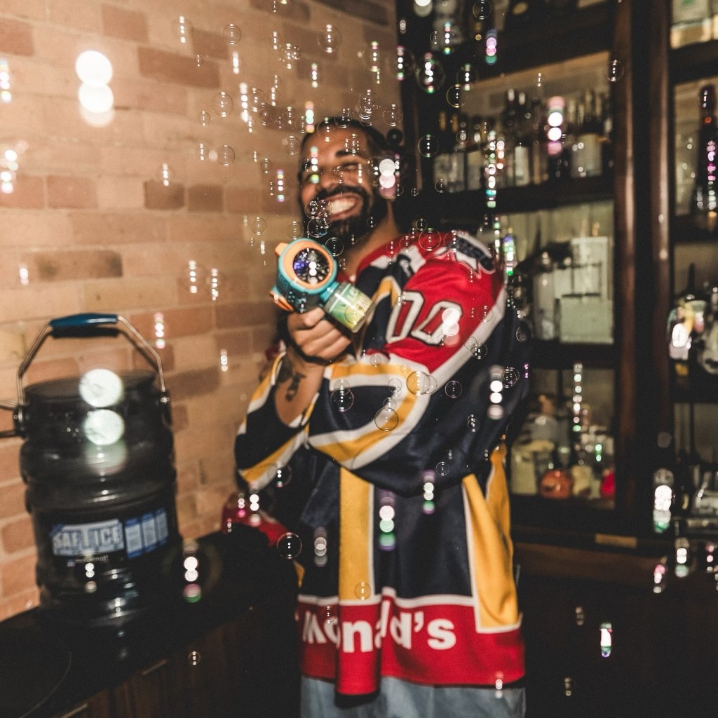 Drake posing with a bubble gun earlier this month.