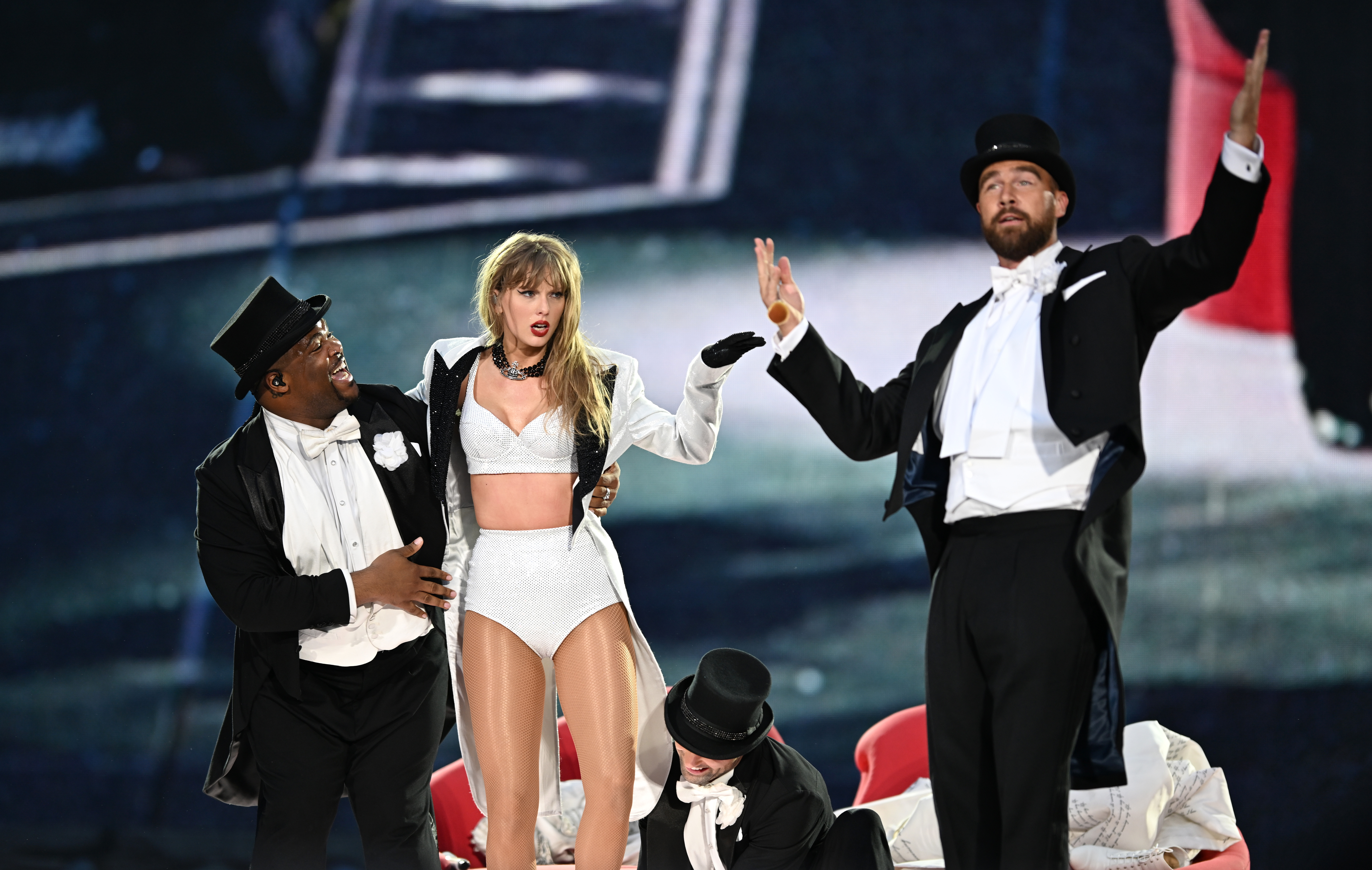 Travis Kelce joining Taylor Swift onstage during the Eras Tour London.