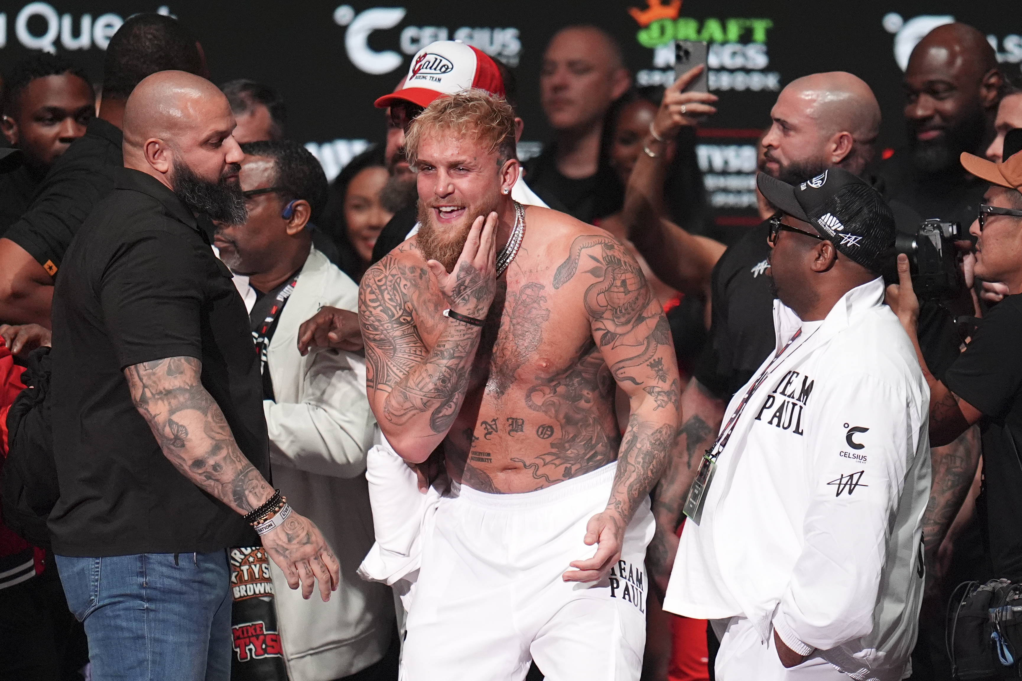 Jake Paul smiling at the weigh-in