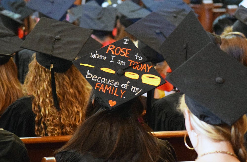 Graduating students often decorate their mortar boards during graduation with messages of thanks to family members.