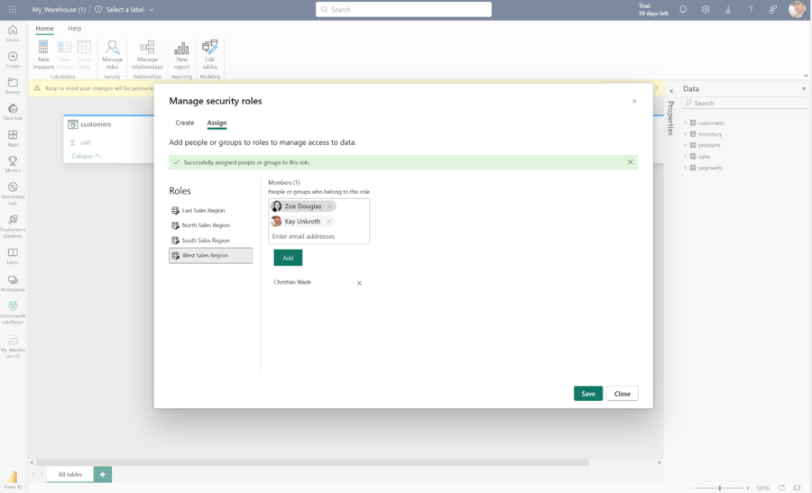 This is a screenshot of an admin managing the security roles in Power BI. In this case they are adding two new members to an defined role. 