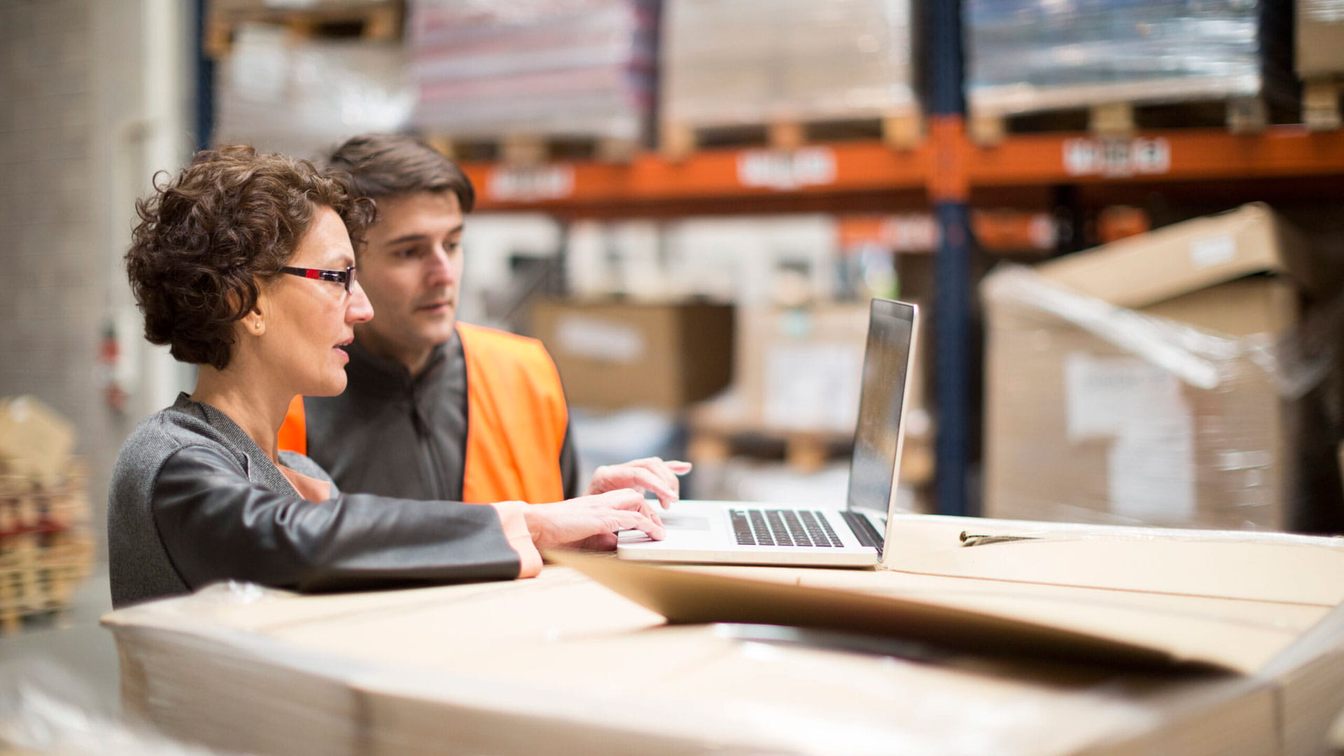 Male and female warehouse workers