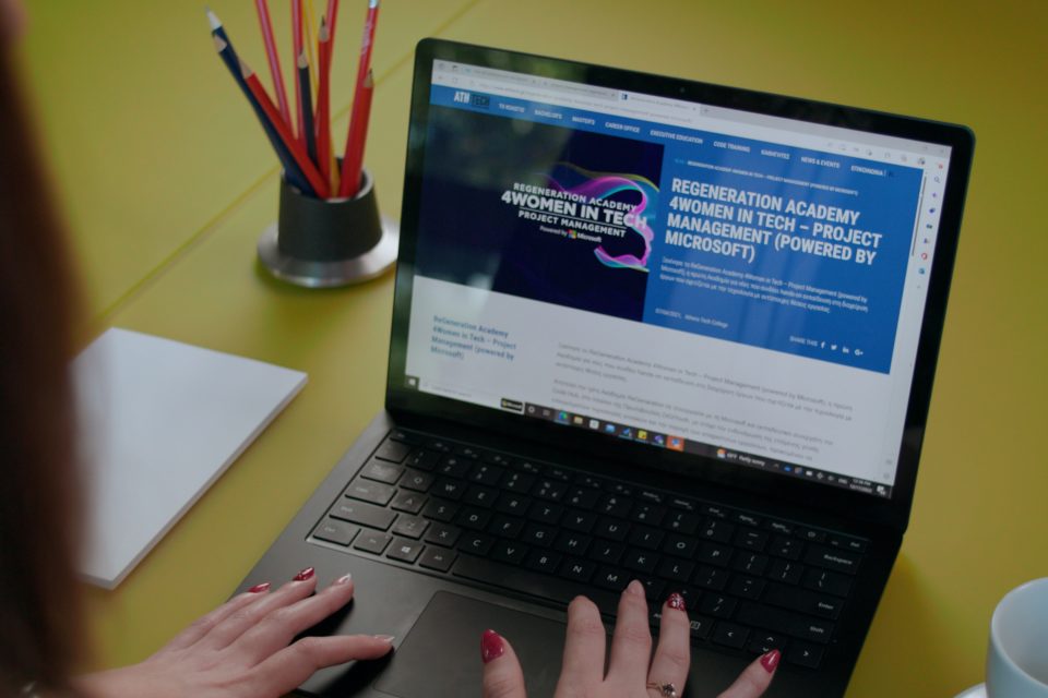 Woman typing on laptop