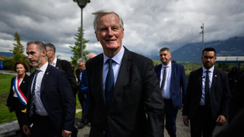 French Prime Minister Michel Barnier leaves after a visiting the INES (Institut National de l’Energie Solaire) in Le Bourget du Lac, eastern France, on September 12, 2024.