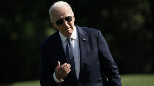 US President Joe Biden walks on the South Lawn as he returns to the White House on September 14, 2024 in Washington, DC. 