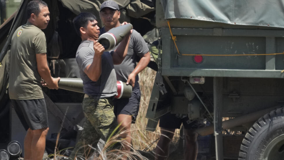 Philippine troopers load artillery during a joint military exercise on Wednesday, May 8, 2024, in Laoag, Ilocos Norte, northern Philippines.