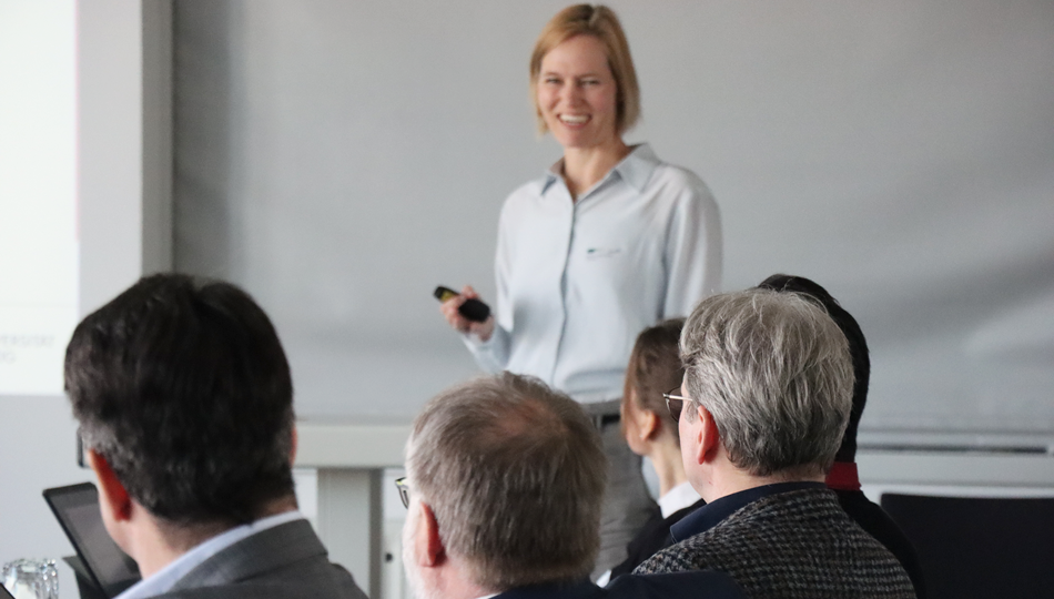 Photo. Prof. Birte Platow presenting at the Visit of the Coordination Committee.