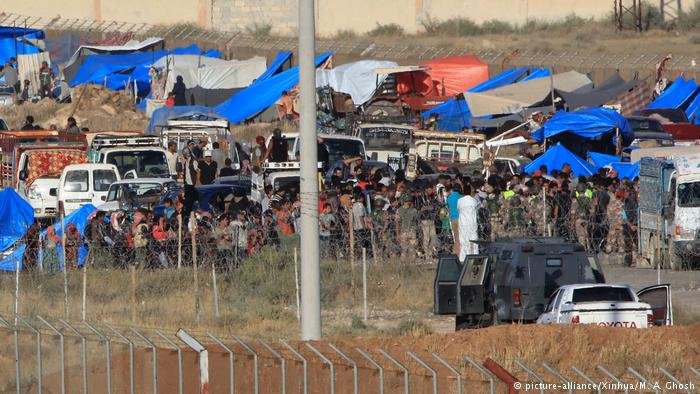 Syrian refugees trapped on the border with Jordan