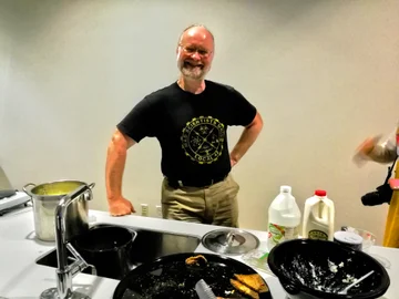 Patrik making cheese at Global Community Bio Summit at MIT Media Lab, Sept 24 2017. Photo by Arunav Conwar.