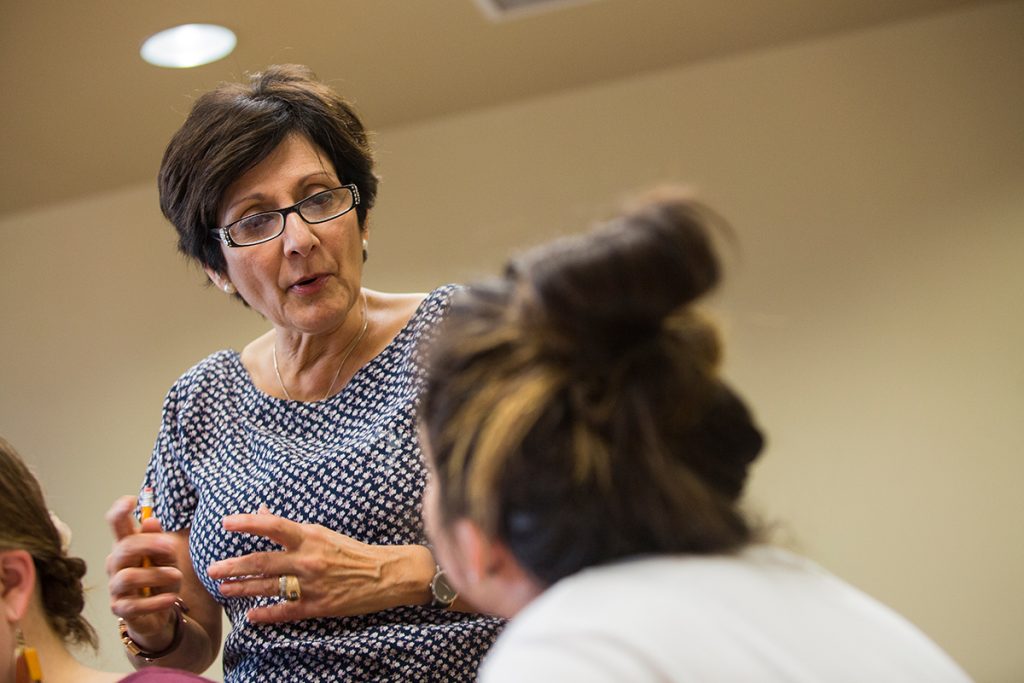 Professor Anat Maimon talks to a student