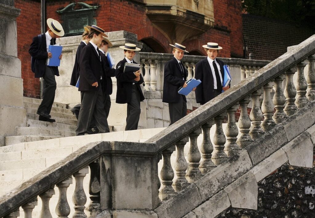 Pupils in boaters at Harrow School