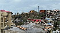 Damaged houses are seen in Mamoudzou, in the French Indian Ocean territory of Mayotte.