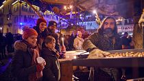 A family buy roasted chestnuts at Esslingen Christmas Market