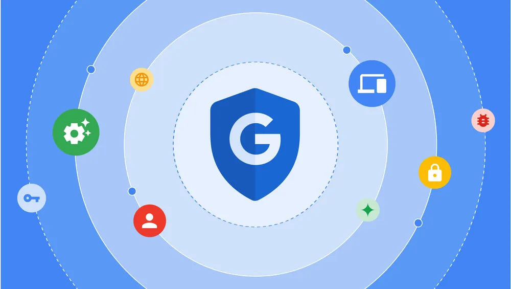 illustration of a blue shield with a grey "G" on it, with circles around it featuring illustrated icons like a key, a lock, a bug, a person, a laptop, linking to a YouTube video