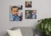 Image showing canvas prints from Google Photos hanging on a grey wall in a living room.