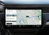 A screen in a Rivian is shown using Google Maps, with an AI summary of Yosemite National Park, created by Gemini capabilities in Places API.