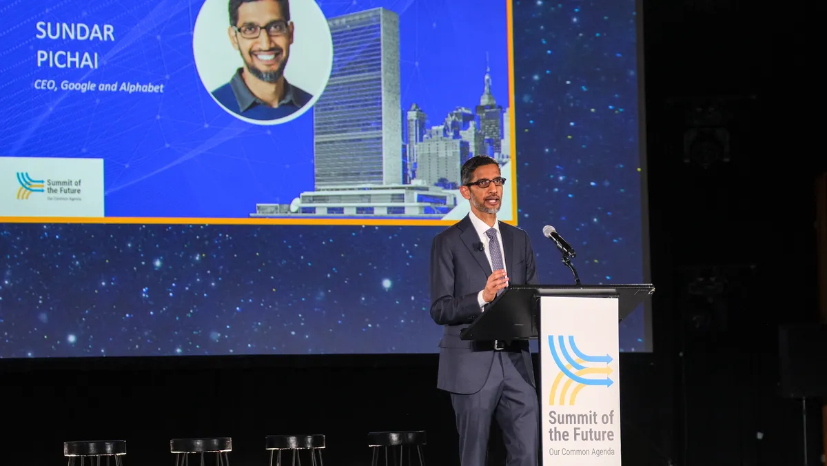 Sundar Pichai delivering a speech on stage