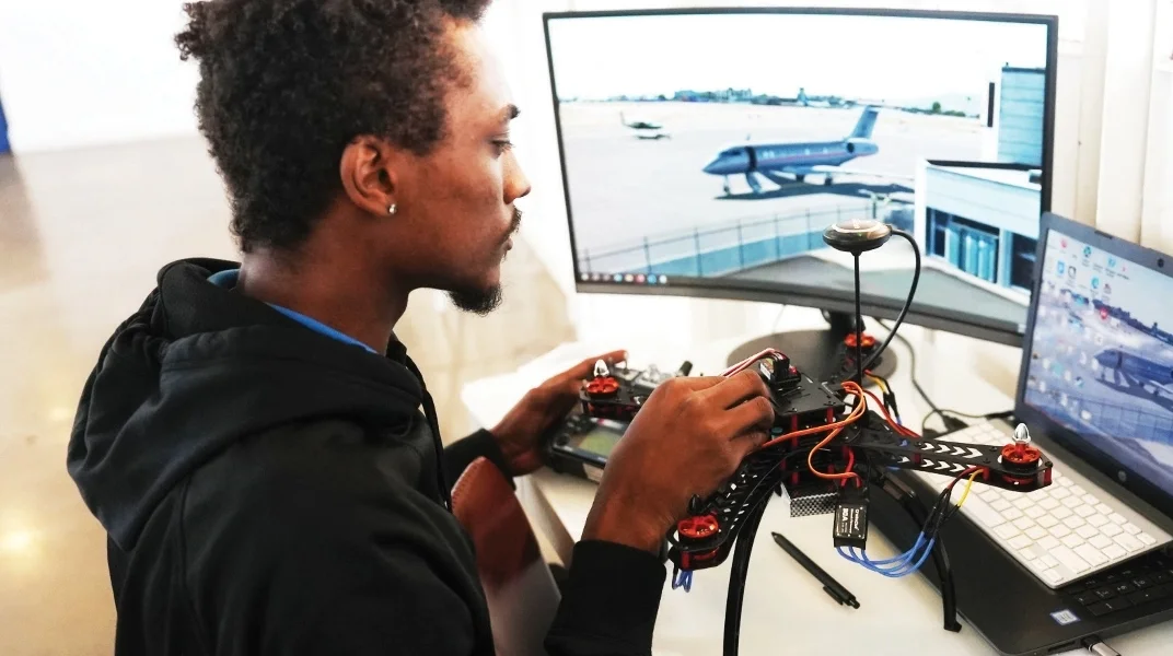 A man working on a piloting system