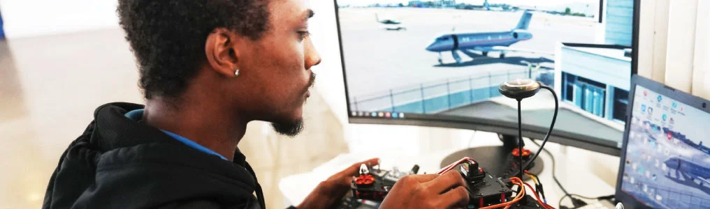 A man working on a piloting system