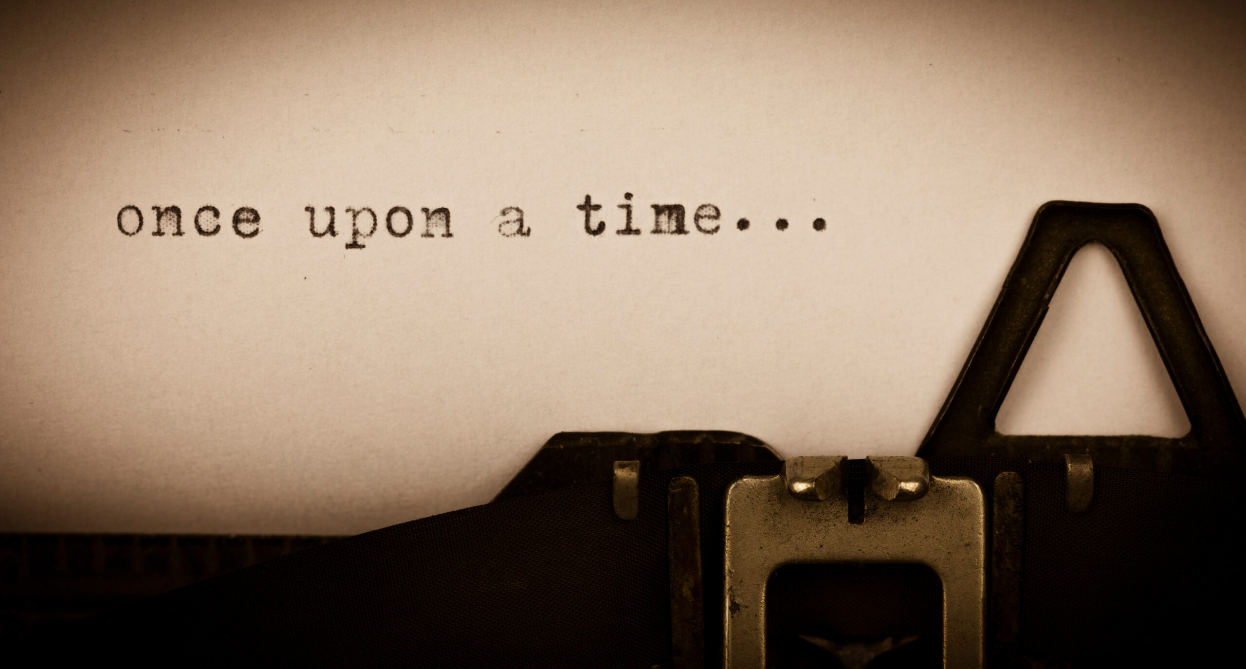 typewriter typing words once upon a time