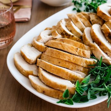 Platter of slow cooker turkey breast for Thanksgiving.