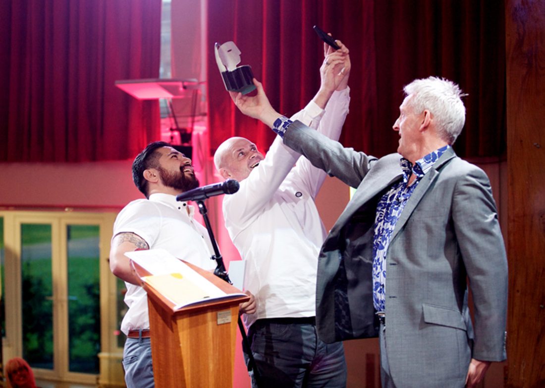 Taking A Selfie With The Award On Stage