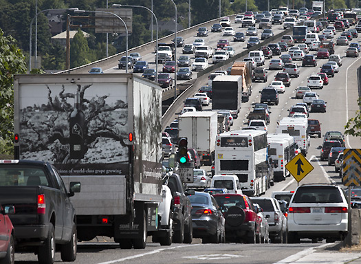 cars and trucks in traffic on I-5