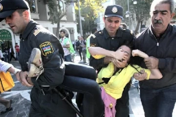 Why do Azeri law enforcement need 3,810 "public" assistants?