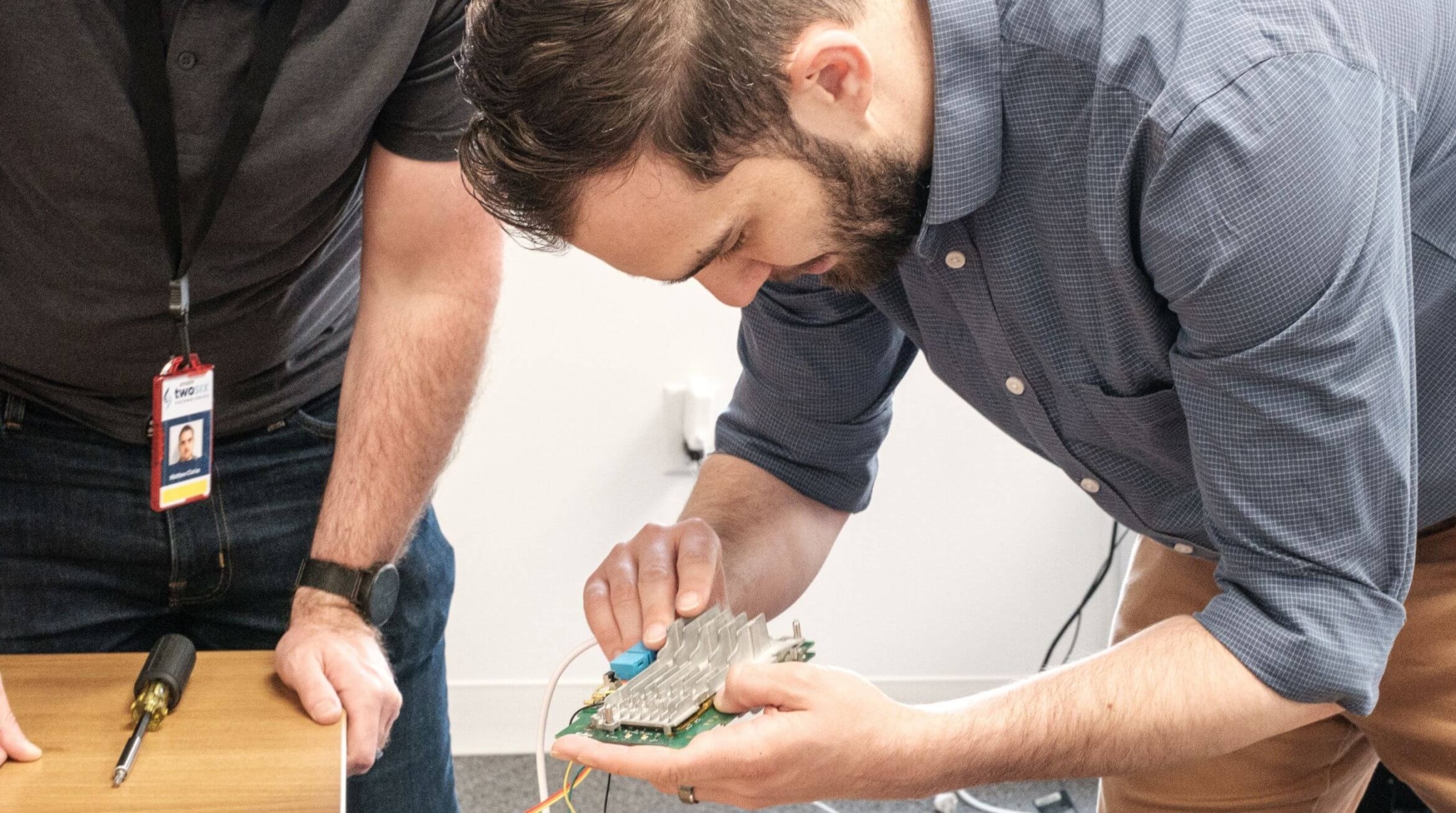 Man Holding a Circuit Board